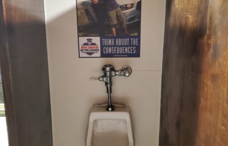 Bar Media bathroom advertising